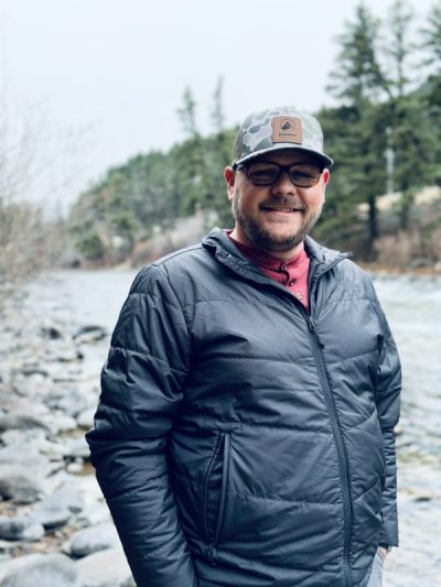 Picture of Seth by a river in Montana